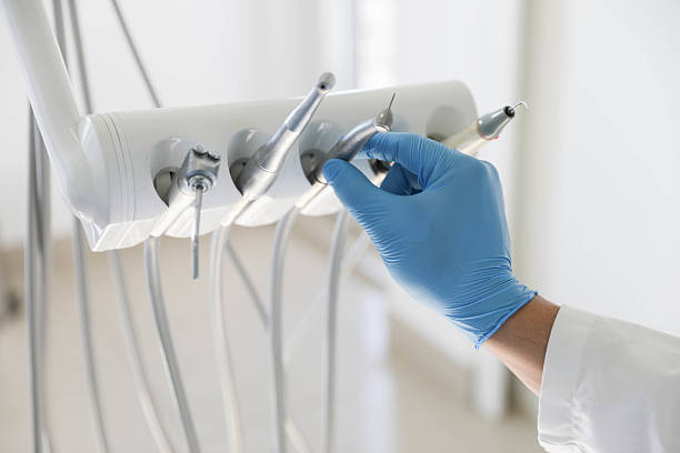 Professional Root Canal Treatment technician working in West Freehold, NJ